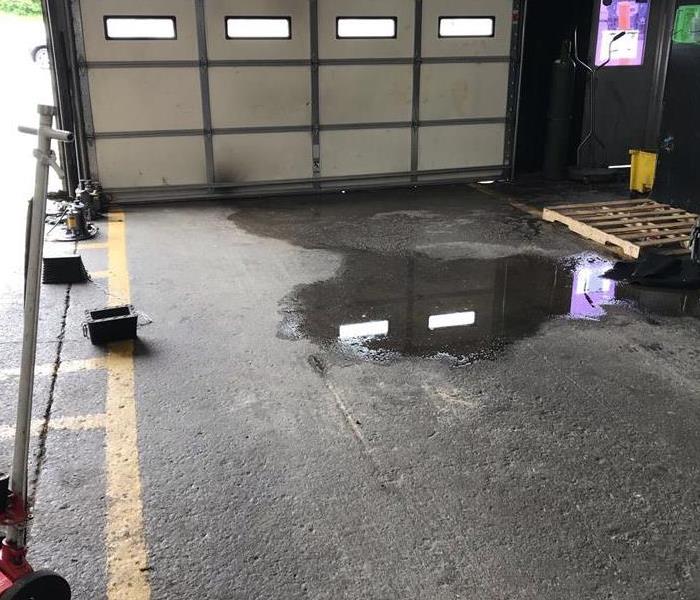 Standing water in mechanic garage 