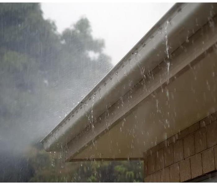 Leaking gutters during heavy rainfall