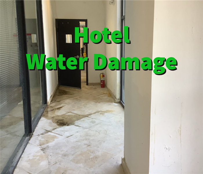 Hotel water damage in a hotel hallway