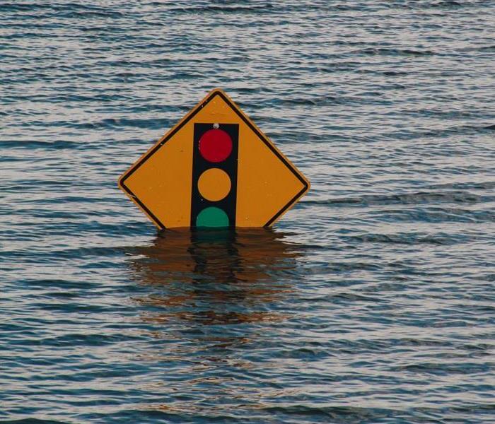 Road sign under water 